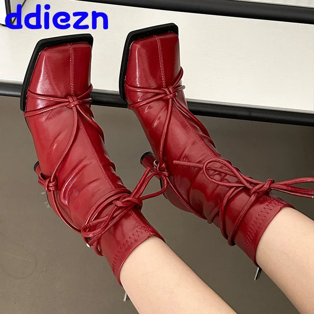 Cross-tied stretch ankle boots