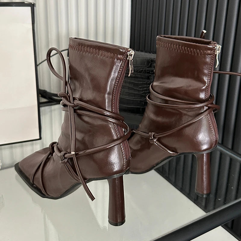 Cross-tied stretch ankle boots